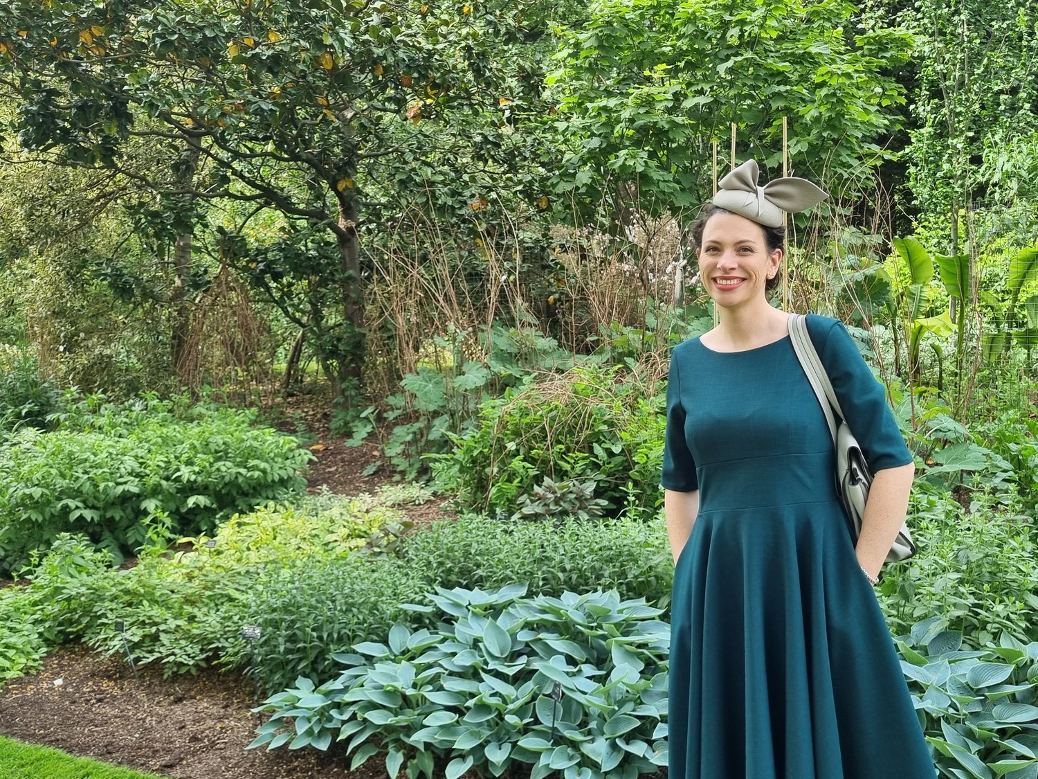 Person stood in front of Herbaceous border in Buckingham Palace Gardens